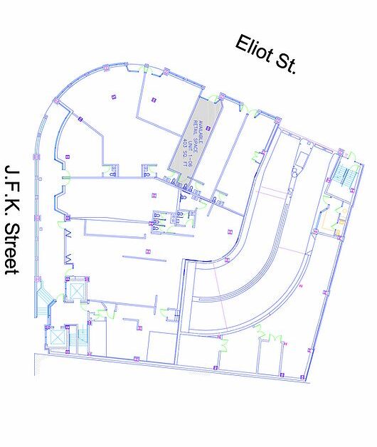 Floor plan showing a layout with J.F.K. Street and Eliot Street labeled. Details include room placements and doorways, relevant for building design analysis.
